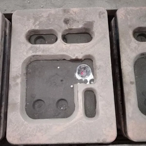 Sand mold with melted iron