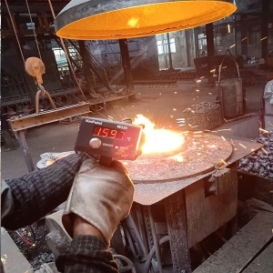 iron smelting to reduce iron ore into metallic iron